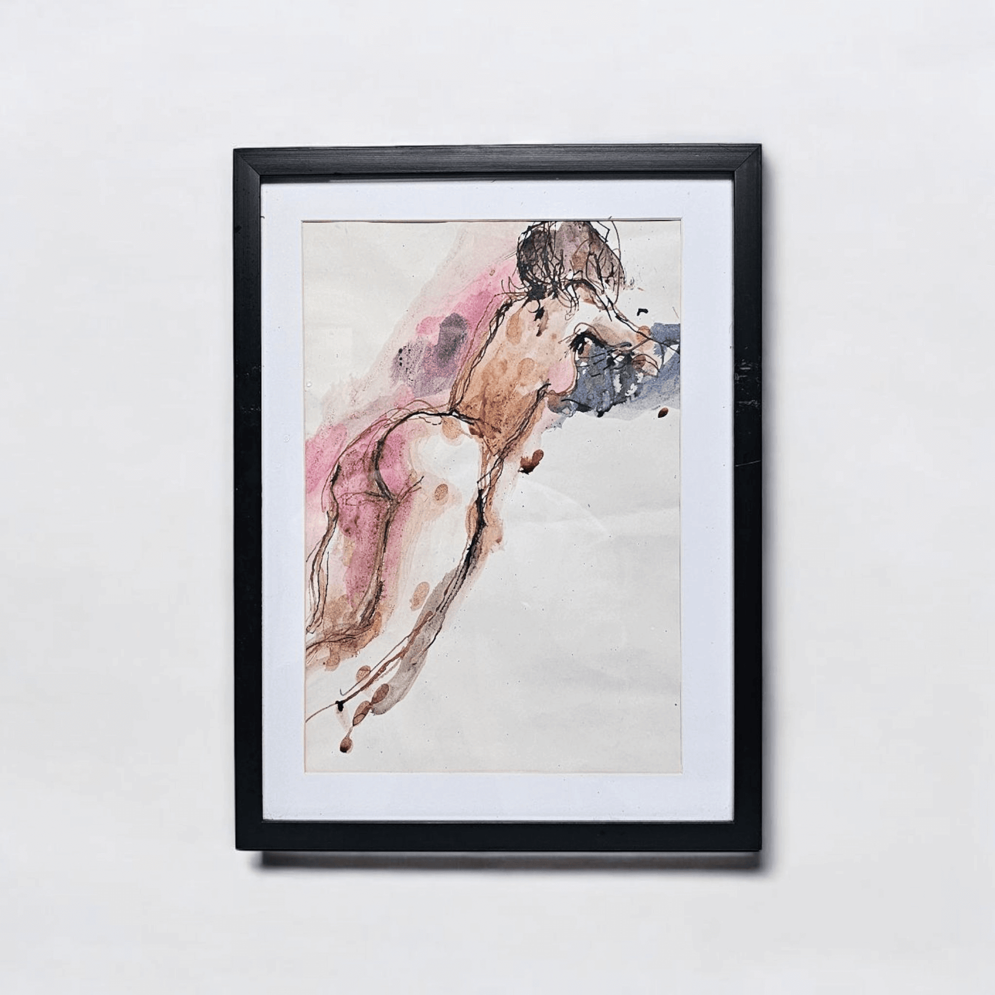 Leaning into Silence artwork featuring a solitary figure in repose, created with ink and watercolor, framed in black.