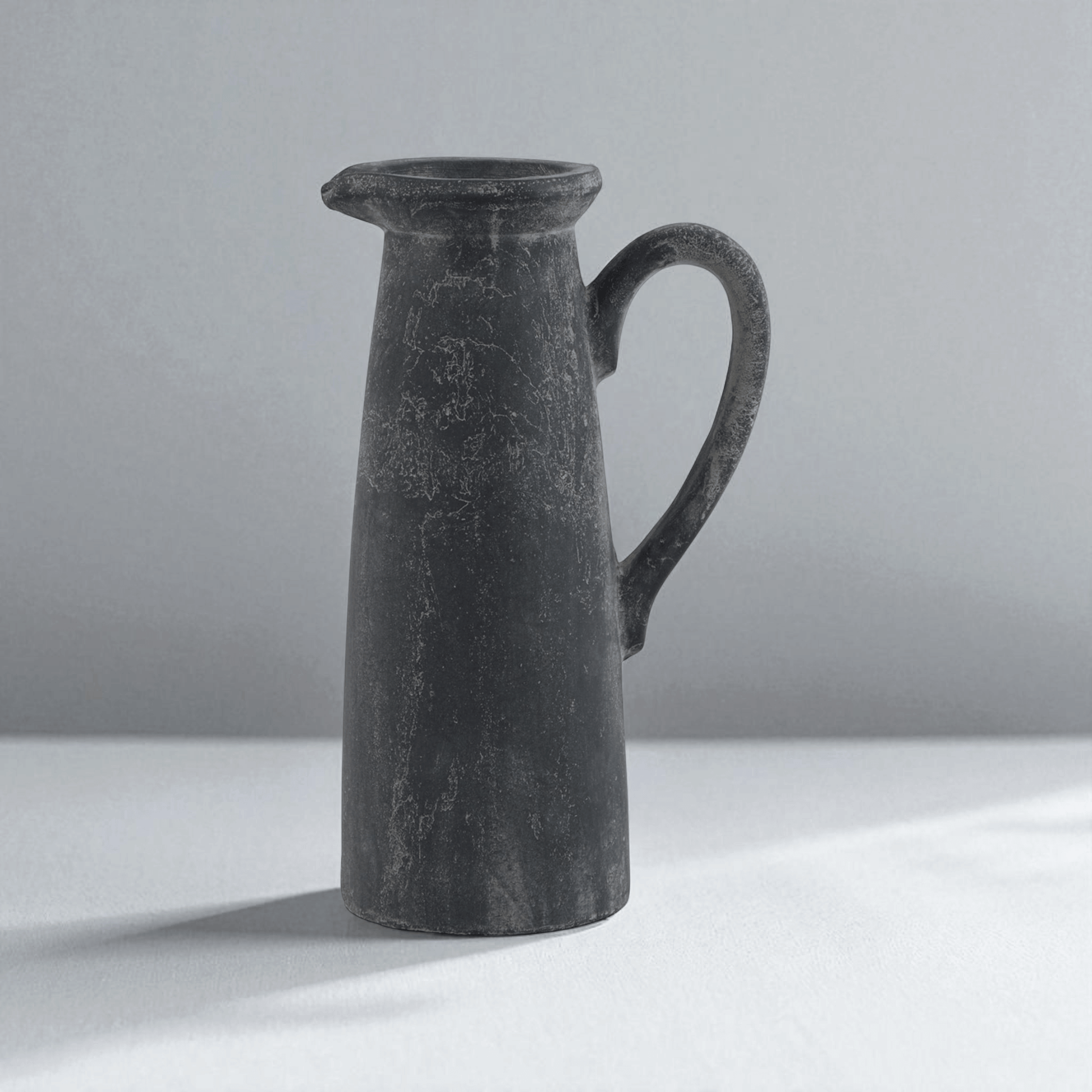 Sculptural Amalfi grey tall jug, Mediterranean influences, perfect for modern and traditional displays, 32cm high.